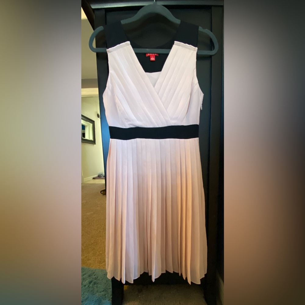 A classy nude rose n black dress. Pre loved.